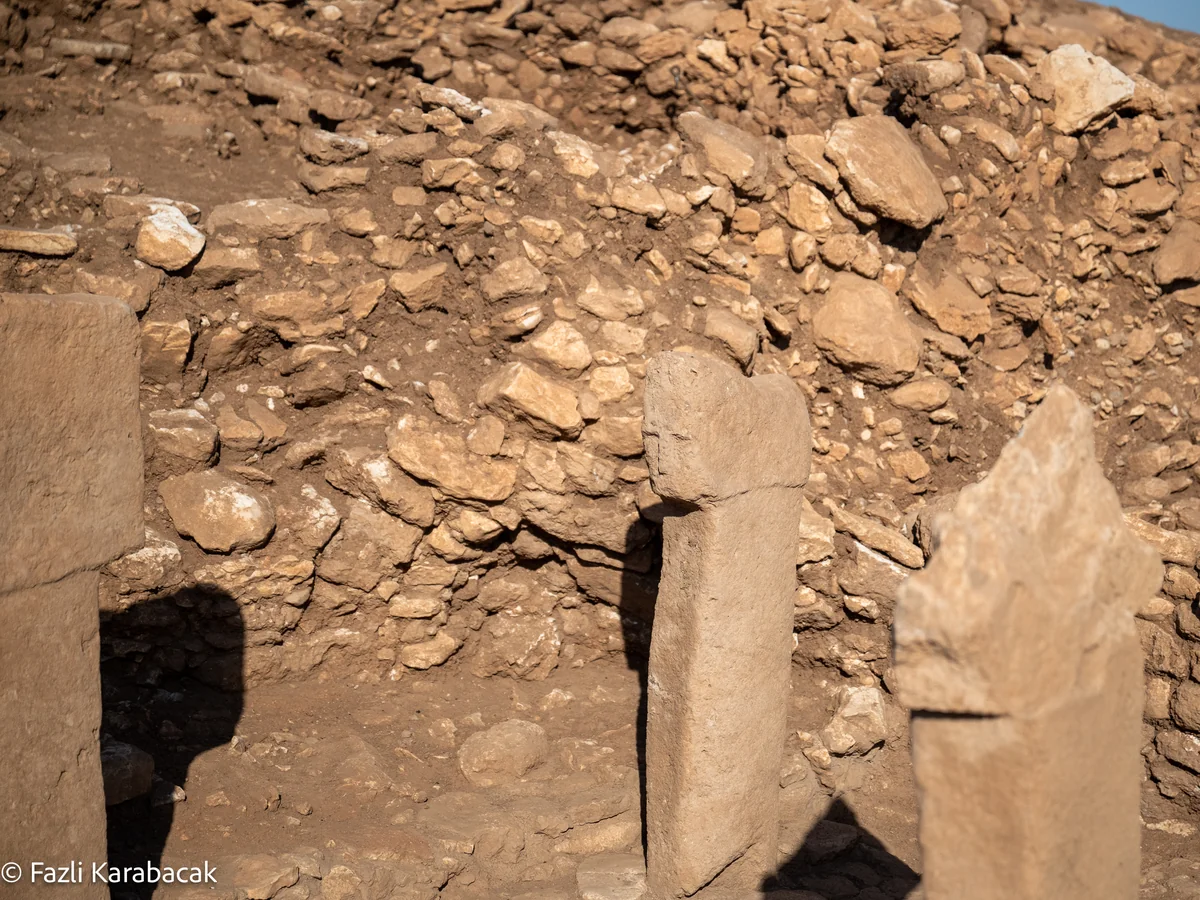 Human figure relief carved on pillar at Karahantepe
